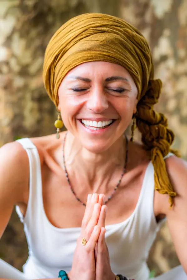 A PHOTO OF VALENTINA BEING GRATEFUL TO THEIR PARTICIPANTS IN A RETREAT. 